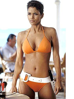 Smoking hot, wet Halle Berry in orange bikini in James Bond - Die Another Day (2002).