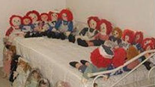 A witchly coven of redheaded dolls arrayed for some orgy or dark rite. 